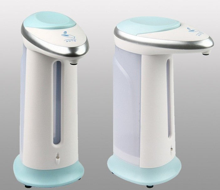 Hands-free automatic soap dispenser in a modern bathroom sink setup