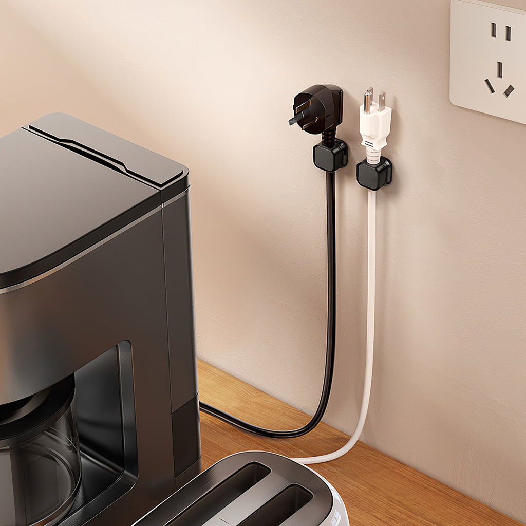 Magnetic cable organizer set holding multiple cables on desk