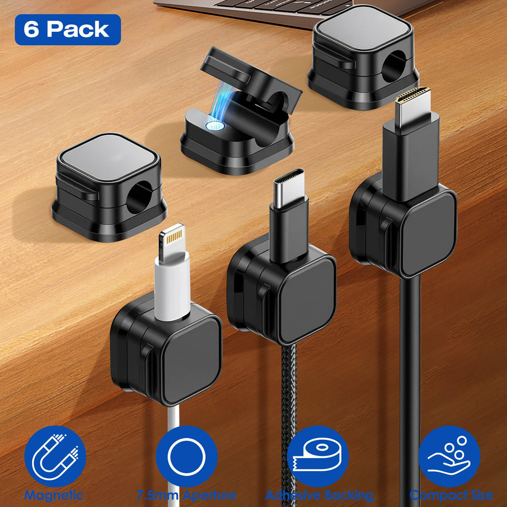 Magnetic cable organizer set holding multiple cables on desk