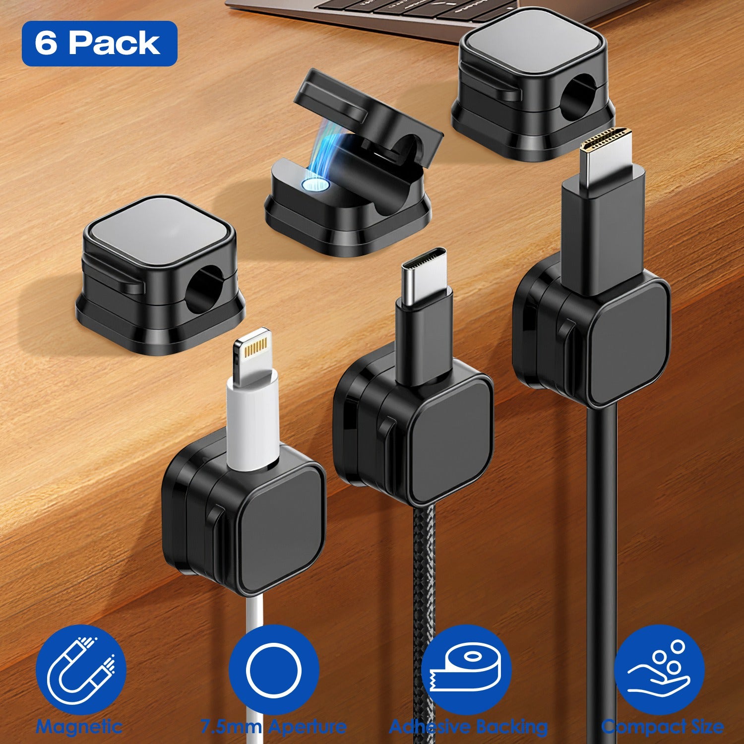 Magnetic cable organizer set holding multiple cables on desk
